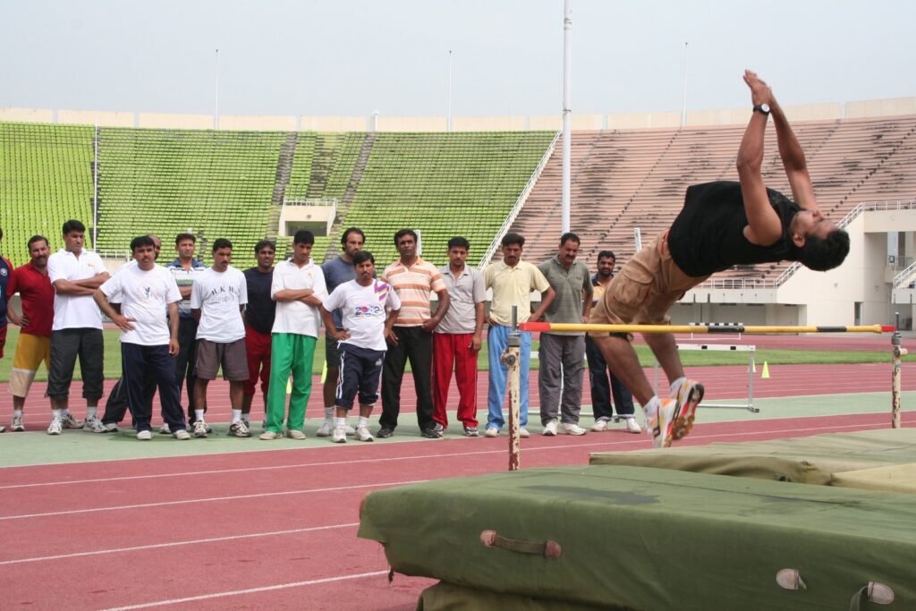 Coaches observing an outdoor practical demonstration