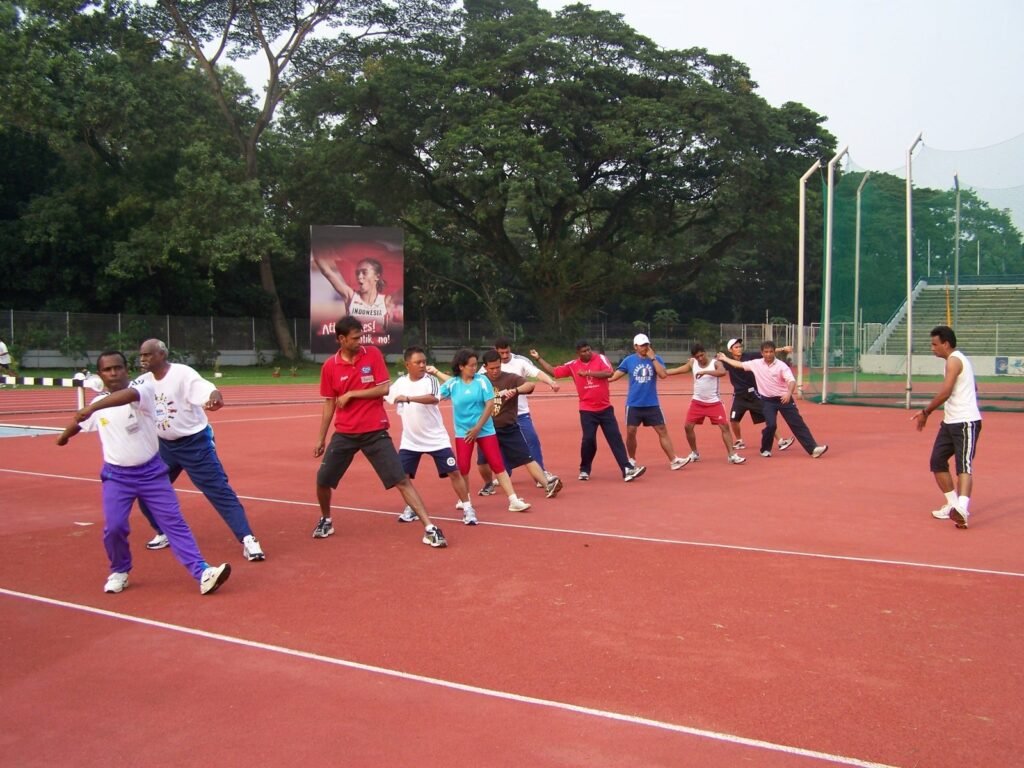 Outdoor track coaching practice with adult learners