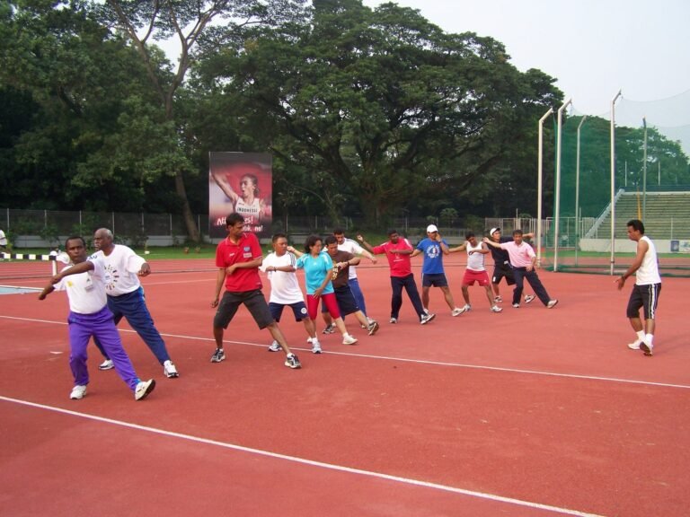 Outdoor track coaching practice with adult learners